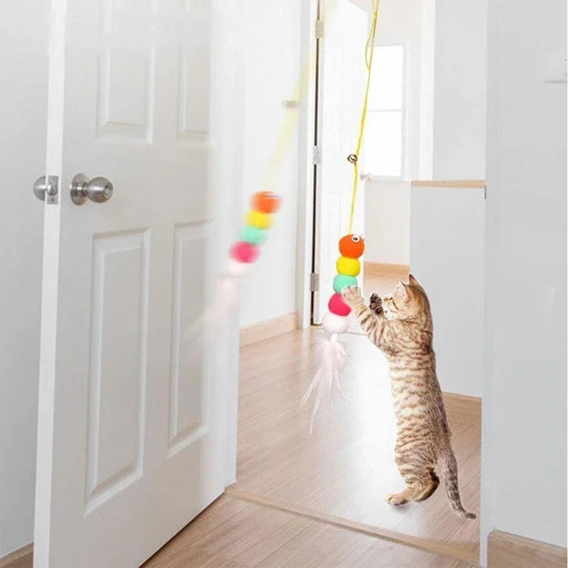 Jouet à suspendre à la porte pour chat — élastique et plumes – photo 4