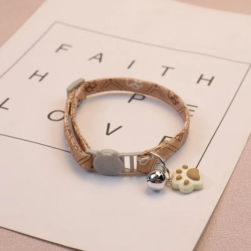 Collier pour chat avec clochette — réglable, motifs empreintes – photo 12